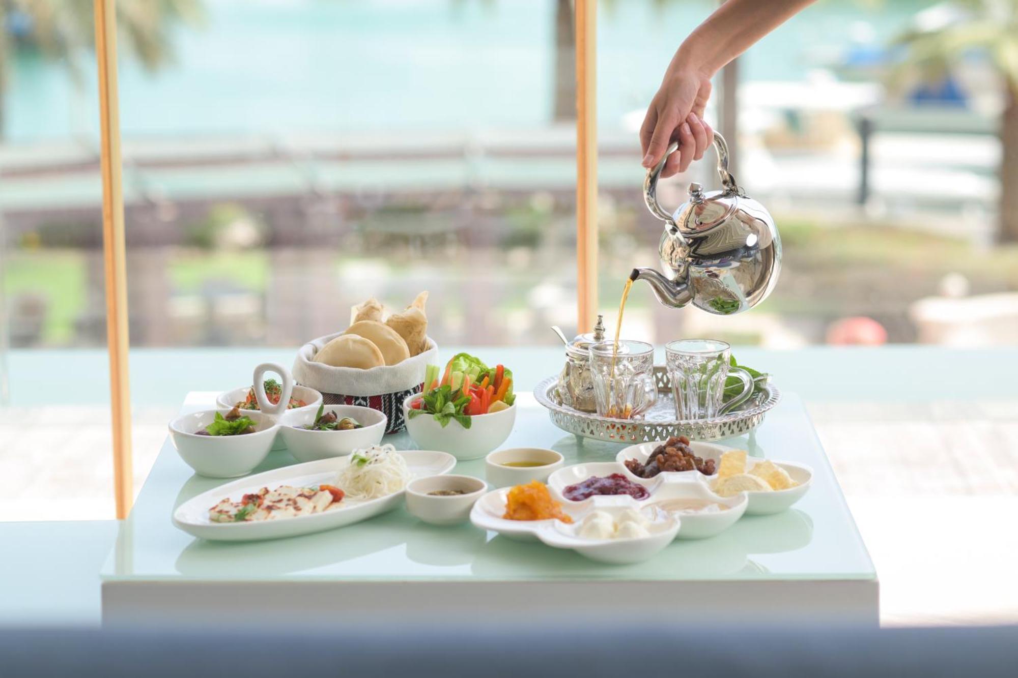 Four Seasons Hotel Ad Dawhah Esterno foto Israeli cuisine